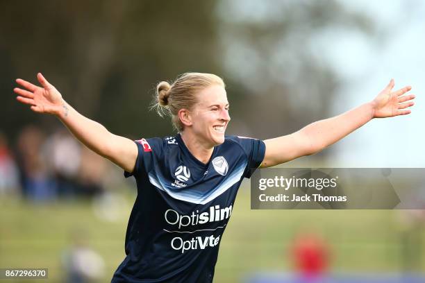 Natasha Dowie of the Victory celebrates a goal during the round one W-League match between Melbourne Victory and Canberra United at Epping Stadium on...