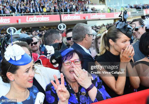 Christine Bowman, Debbie Kepitis and Stephanie Waller react after Hugh Bowman wins aboard Winx in Race 9, Ladbrokes Cox Plate during Cox Plate Day at...