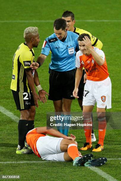 Roy Krishna of the Phoenix appeals to referee Jarred Gillett after a challenge on Luke DeVere of Brisbane during the round four A-League match...