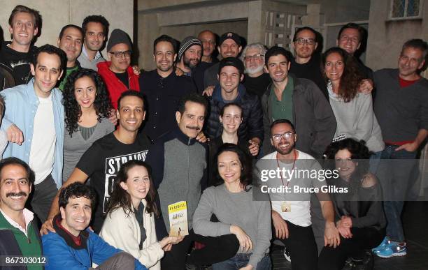 Lin Manuel Miranda and Jonathan Groff pose backstage with Tony Shalhoub and the cast of the new hit musical "The Band's Visit" on Broadway at The...