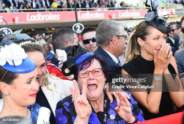Christine Bowman, Debbie Kepitis and Stephanie Waller react after Hugh Bowman wins aboard Winx in Race 9, Ladbrokes Cox Plate during Cox Plate Day at...
