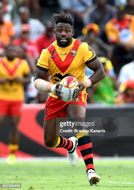 James Segeyaro of Papua New Guinea in action during the Rugby League World Cup match between Papua New Guinea and Wales at Oil Search National...