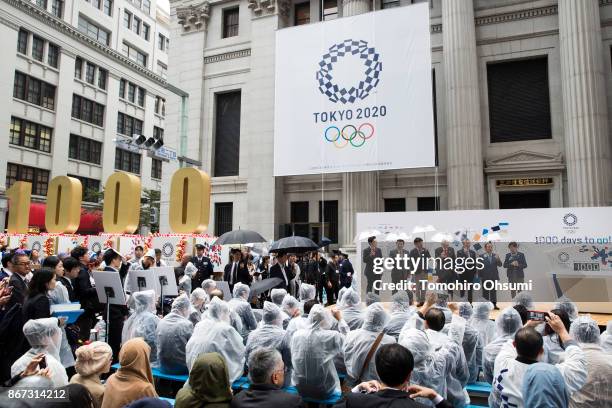 Tokyo Governor Yuriko Koike, Tokyo 2020 Chief Executive Officer Toshiro Muto, second from right, and Japanese Olympic Committee President Tsunekazu...