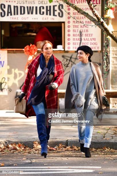 Jennifer Lopez and Vanessa Hudgens seen on location for 'Second Act' in Queens on October 27, 2017 in New York City.