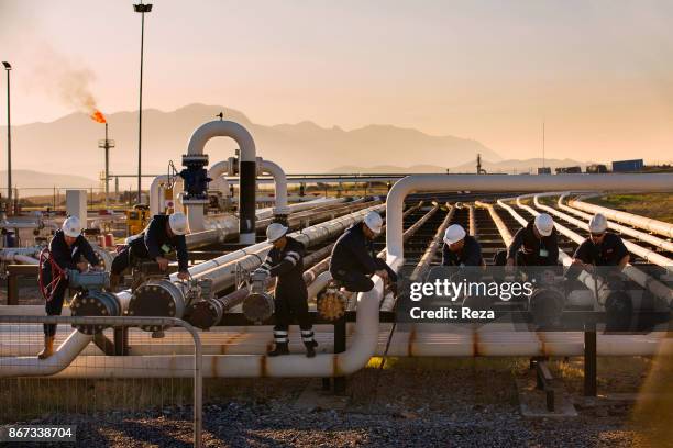 Workers working at the Kawergosk refinery. The oil production in Iraqi Kurdistan is supposed to represent 30% of the Iraqi production, according to...