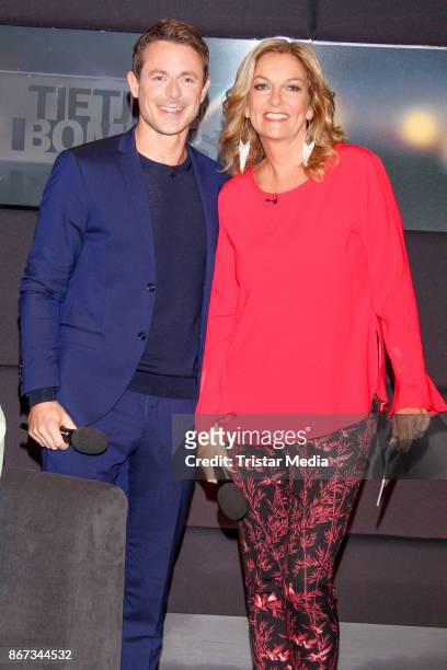 German presenter Alexander Bommes and German presenter Bettina Tietjen during the TV Show 'Tietjen und Bommes' on October 27, 2017 in Hanover,...