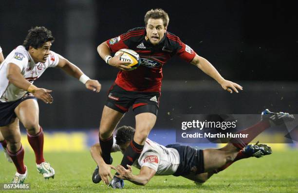 Tim Bateman of the Crusaders makes a break during the round 13 Super 14 match between the Crusaders and the Reds at AMI Stadium on May 8, 2009 in...