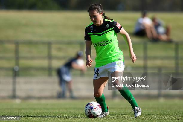 Kendall Fletcher of Canberra runs with the ball during the round one W-League match between Melbourne Victory and Canberra United at Epping Stadium...