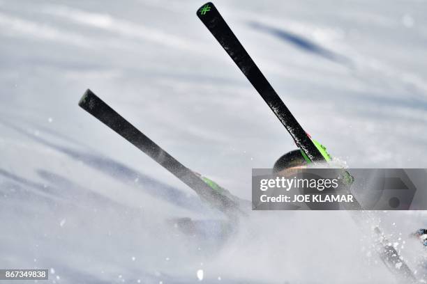 Maria Shkanova of Belarus falls during the women's Giant Slalom event of the FIS ski World cup in Soelden, Austria on October 28, 2017.