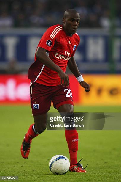 Guy Demel of Hamburg runs with the ball during the UEFA Cup Semi Final second leg match between Hamburger SV and SV Werder Bremen at the HSH Nordbank...