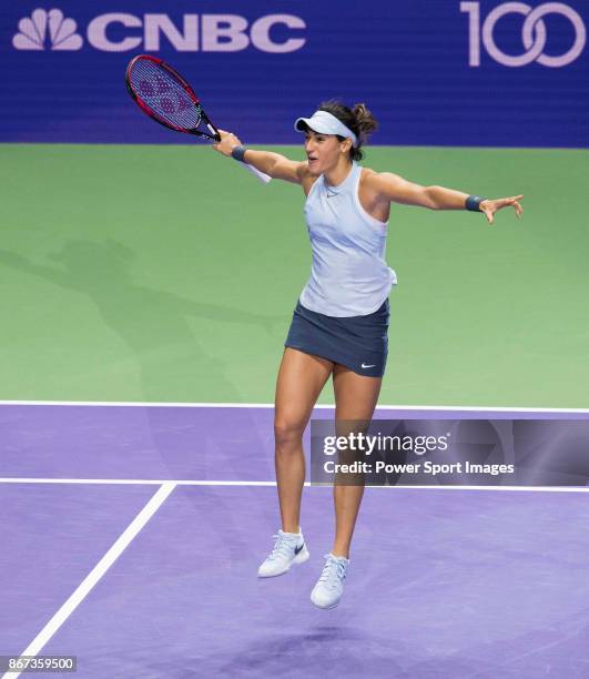 Caroline Garcia of France celebrates victory in her singles match against Caroline Wozniacki of Denmark during day 6 of the BNP Paribas WTA Finals...