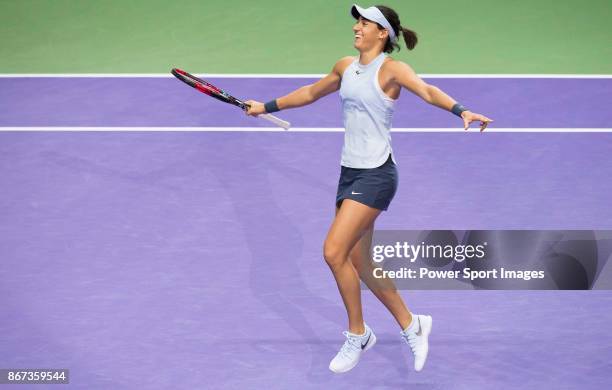 Caroline Garcia of France celebrates victory in her singles match against Caroline Wozniacki of Denmark during day 6 of the BNP Paribas WTA Finals...