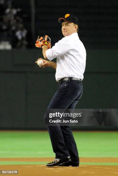 Actor Tom Hanks throws the ceremonial first pitch prior to the professional baseball match between Yomiuri Giants and Chunichi Dragons at Tokyo Dome...