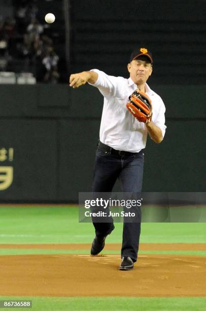 Actor Tom Hanks throws the ceremonial first pitch prior to the professional baseball match between Yomiuri Giants and Chunichi Dragons at Tokyo Dome...