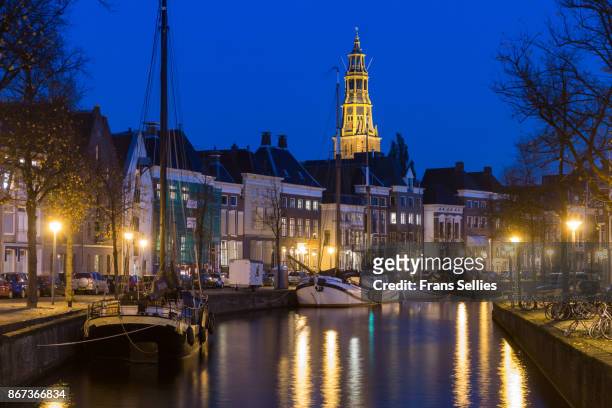 groningen city view in the evening, the netherlands - groningen stad stockfoto's en -beelden