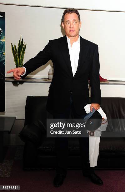 Actor Tom Hanks poses for a photograph at the reception room during professional baseball match between Yomiuri Giants and Chunichi Dragons at Tokyo...