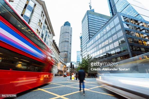 long exposure view of a street in financial district in london, greater london, uk - greater london stock-fotos und bilder
