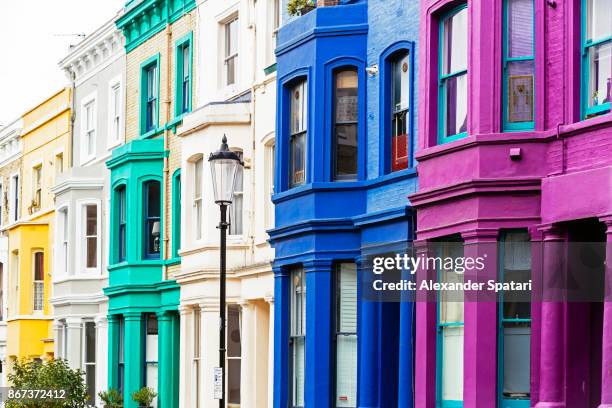 colorful vibrant houses in notting hill, london, uk - notting hill london stock pictures, royalty-free photos & images