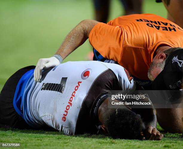 Kevin Naiqama of Fiji lays on the ground after being injured during the 2017 Rugby League World Cup match between Fiji and the United States on...