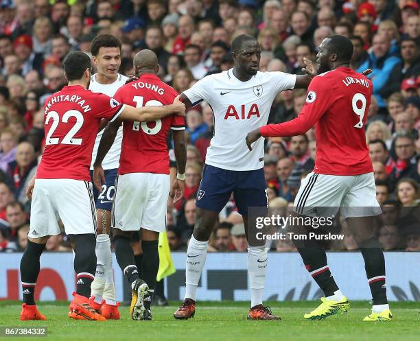 Ashley Young of Manchester United clashes with Dele Alli of Tottenham Hotspur during the Premier League match between Manchester United and Tottenham...