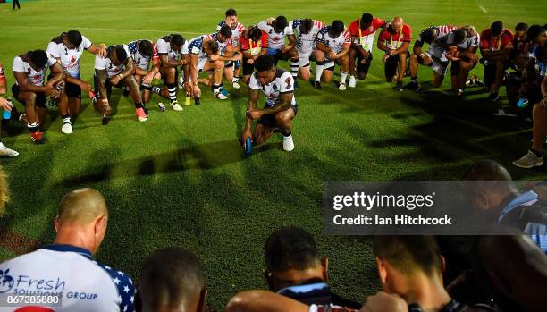 Kevin Naiqama of Fiji leads the two teams in a prayer at the end of the 2017 Rugby League World Cup match between Fiji and the United States on...