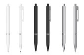 White, Black and Metal Mockup Ballpoint Pens with Blank Space for Yours Logo or Design. 3d Rendering