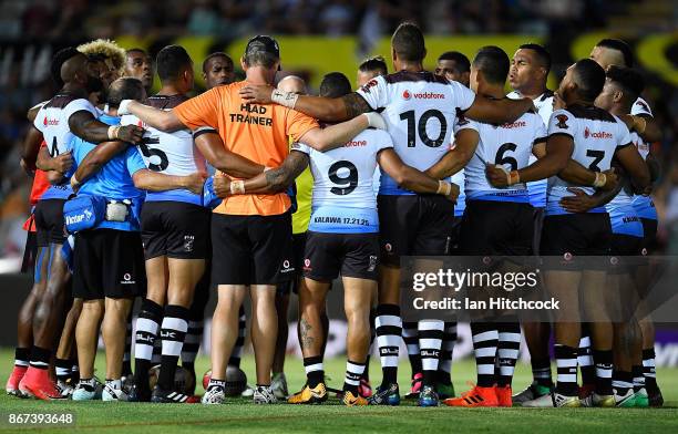 The Fiji team gather in a huddle before the start of the 2017 Rugby League World Cup match between Fiji and the United States on October 28, 2017 in...