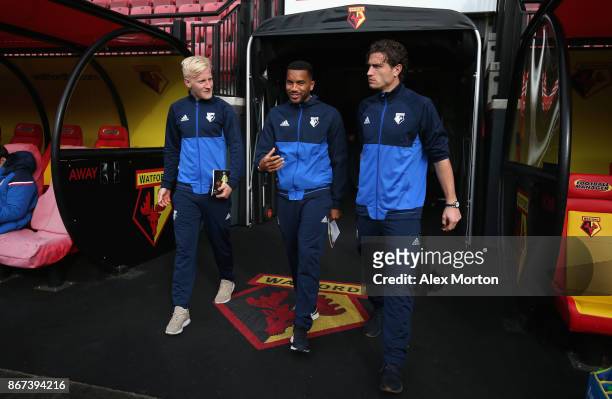 Will Hughes of Watford, Jerome Sinclair of Watford and Daryl Janmaat of Watford arrive at the stadium prior to the Premier League match between...