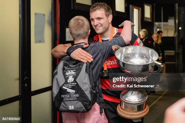 Luke Whitelock of Canterbury is congratulated by a fan after the win in the Mitre 10 Cup Premiership Final match between Canterbury and Tasman at AMI...