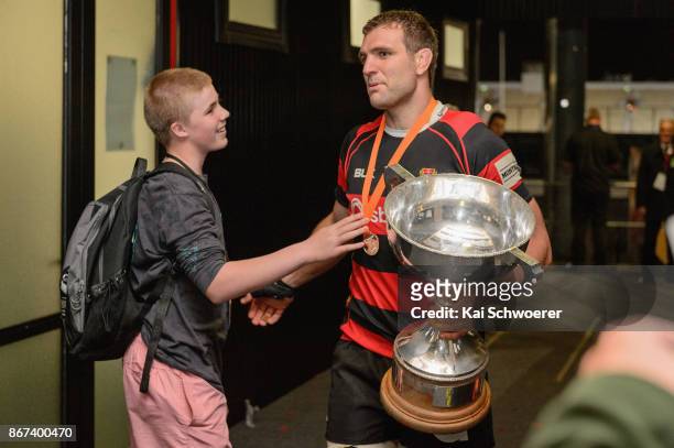 Luke Whitelock of Canterbury is congratulated by a fan after the win in the Mitre 10 Cup Premiership Final match between Canterbury and Tasman at AMI...