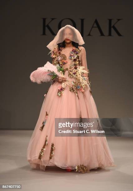 Model walks the runway during the Mohanad Kojak show at Fashion Forward October 2017 held at the Dubai Design District on October 28, 2017 in Dubai,...
