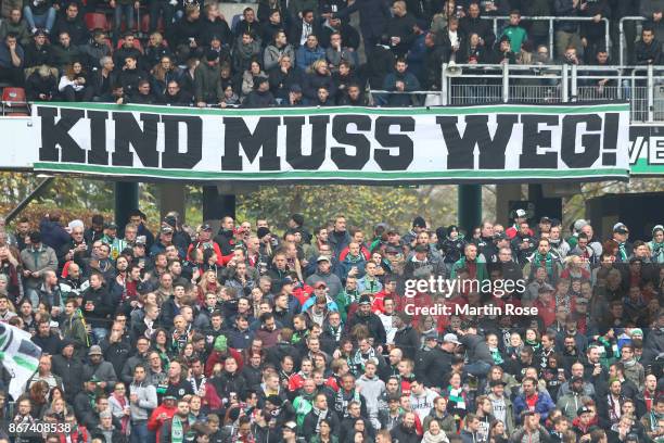 Supporters of Hannover voice their opinion against Martin Kind, chairman of Hannover, before the Bundesliga match between Hannover 96 and Borussia...