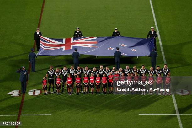 Players of the New Zealand Kiwis stand for the national anthem during the 2017 Rugby League World Cup match between the New Zealand Kiwis and Samoa...