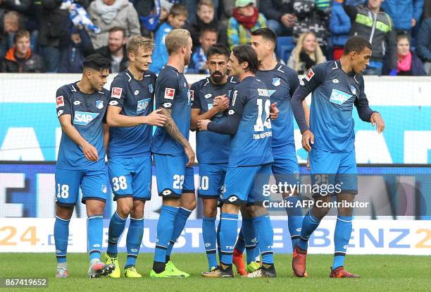 Hoffenheim's German midfielder Kerem Demirbay celebrates scoring the 1-0 during the German First division Bundesliga football match TSG 1899...