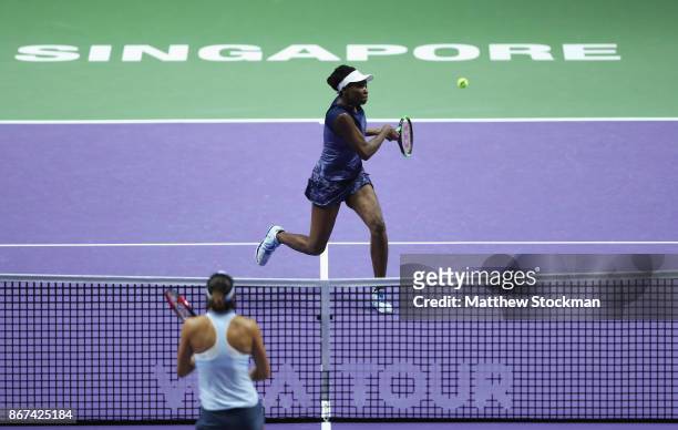 Venus Williams of the United States comes to the net in her singles semi final match against Caroline Garcia of France during day 7 of the BNP...