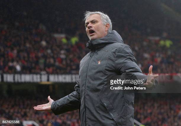 Manager Jose Mourinho of Manchester United watches from the touchline during the Premier League match between Manchester United and Tottenham Hotspur...