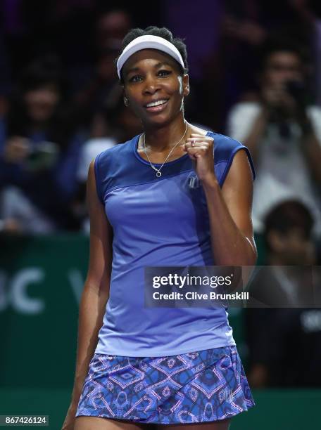 Venus Williams of the United States celebrates victory in her singles semi final match against Caroline Garcia of France during day 7 of the BNP...