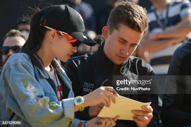 Michal Kwiatkowski from Team SKY signs an autograph to a fan, during the 1st TDF Shanghai Criterium 2017 - Media Day. On Saturday, 28 October 2017,...