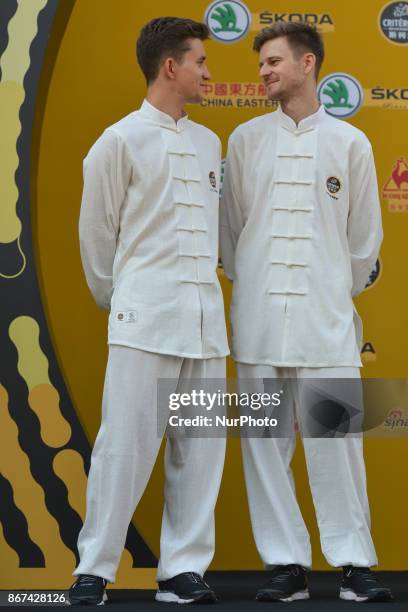 Michal KWIATKOWSKI and Michal GOLAS from Team SKY wear traditional Chinese dresses, during the 1st TDF Shanghai Criterium 2017 - Media Day. On...