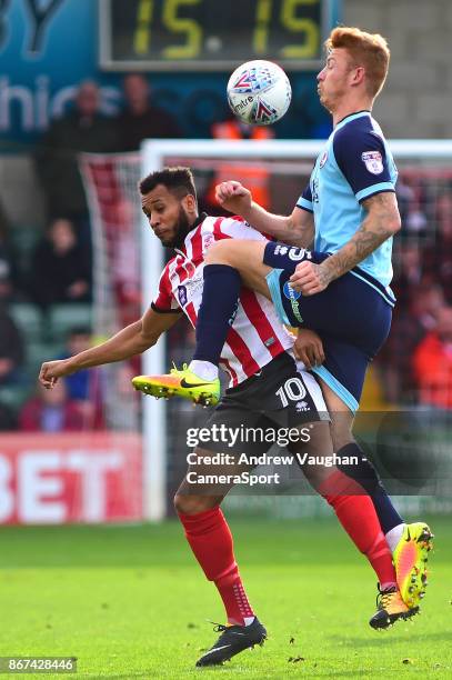 Lincoln City's Matt Green vies for possession with Crawley Town's Josh Yorwerth during the Sky Bet League Two match between Lincoln City and Crawley...