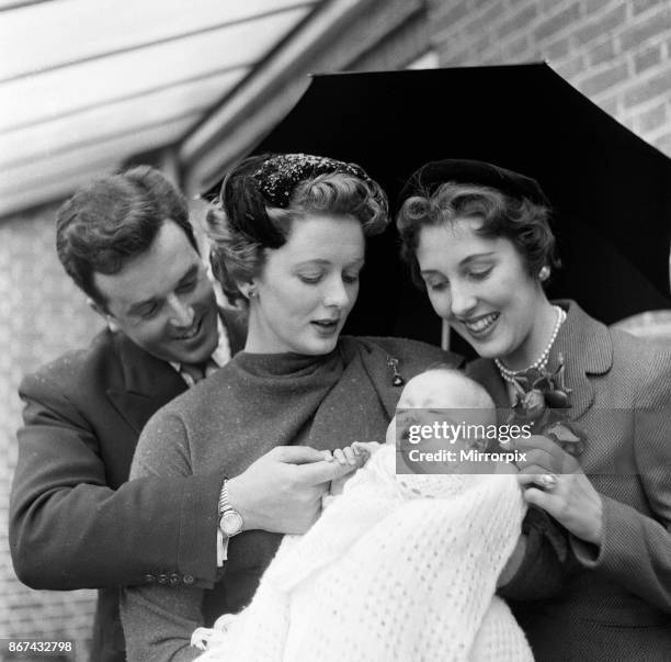 Brian Rix and Elspet Gray at the christening of their daughter Louisa, 2nd May 1955.