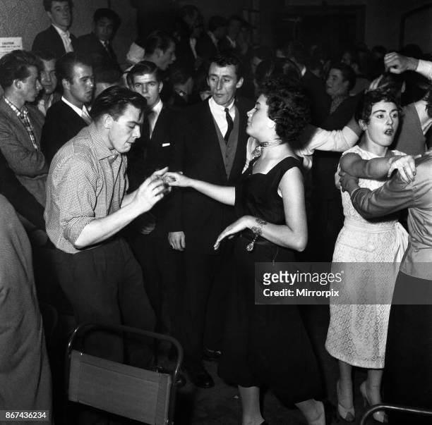 Couple dancing to Rock and Roll music at the Crown and Anchor pub in Brixton, south London. September 1956.