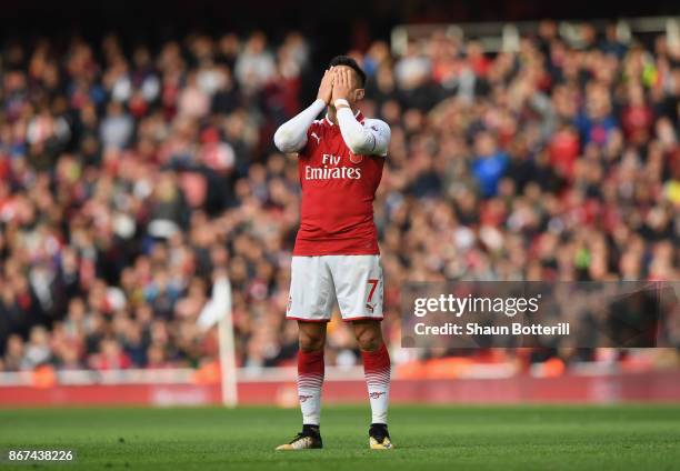 Alexis Sanchez of Arsenal looks dejected during the Premier League match between Arsenal and Swansea City at Emirates Stadium on October 28, 2017 in...
