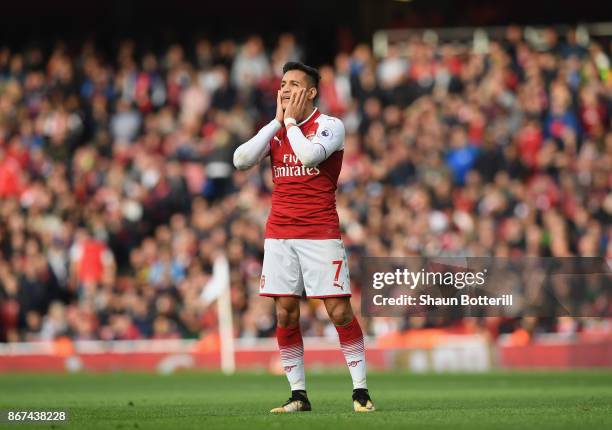 Alexis Sanchez of Arsenal looks dejected during the Premier League match between Arsenal and Swansea City at Emirates Stadium on October 28, 2017 in...