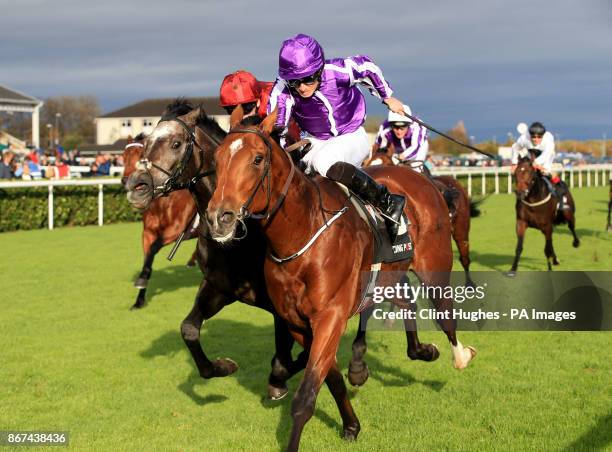 Saxon Warrior ridden by Ryan Moore wins the Racing Post Trophy Stakes during Racing Post Trophy day at Doncaster Racecourse.