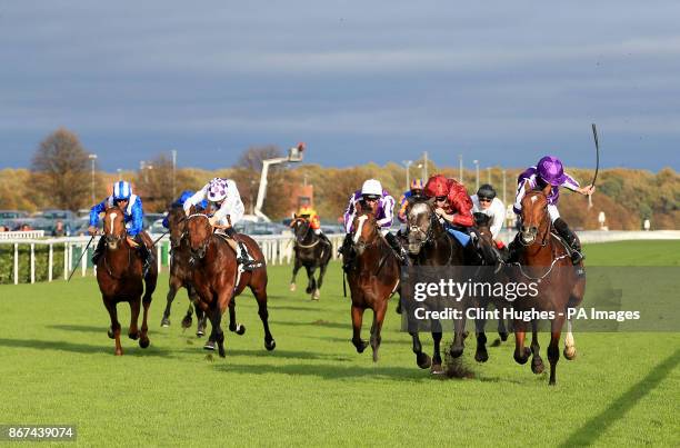 Saxon Warrior ridden by Ryan Moore wins the Racing Post Trophy Stakes during Racing Post Trophy day at Doncaster Racecourse.