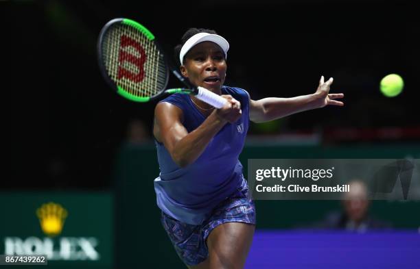 Venus Williams of the United States plays a forehand in her singles semi final match against Caroline Garcia of France during day 7 of the BNP...