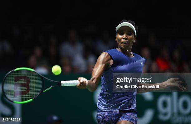 Venus Williams of the United States plays a forehand in her singles semi final match against Caroline Garcia of France during day 7 of the BNP...