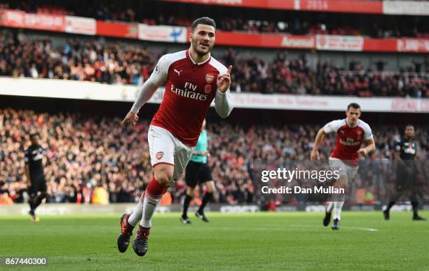 Sead Kolasinac of Arsenal celebrates scoring his sides first goal during the Premier League match between Arsenal and Swansea City at Emirates...