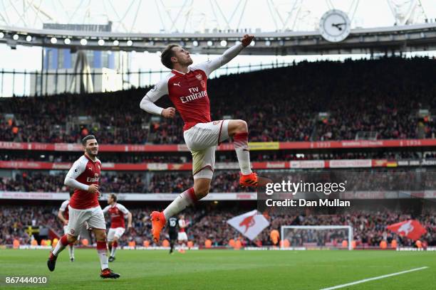 Aaron Ramsey of Arsenal celebrates scoring his sides second goal during the Premier League match between Arsenal and Swansea City at Emirates Stadium...